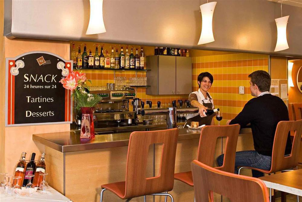 宜必思托农中心酒店 托农莱班 外观 照片